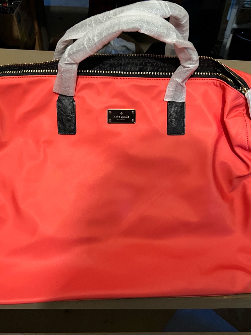kate spade Coral-Red Tote with Black Handles and Gold Plaque